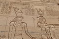 horus and isis on wall of philae temple