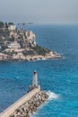 Landmark and architecture: Phare de Nice (Nice Lighthouse) with Port Lympia and Cape the Nice from the Colline du Royalty Free Stock Photo