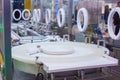 Automated pharma technology concept - conveyor belt with empty glass bottles