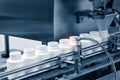 Pharmaceutical industry, medicine pills are filling in the bottle on production line machine conveyor at the medical factory. sel