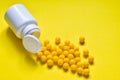 Pharmaceutical medicament pills on yellow background.  Pharmaceutical medicament. Dietary supplements, drugs, Pharmacy, Medicine a Royalty Free Stock Photo