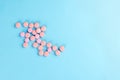 pills, blisters, syringe on a blue background Royalty Free Stock Photo