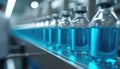 Pharmaceutical production line filling vial bottles blue liquid. Sterile laboratory environment. Process reflects advanced tech Royalty Free Stock Photo
