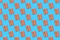 Pharmaceuticals Pills on a blue background. Pattern