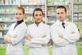 Pharmaceutist woman and man workers in drug store Royalty Free Stock Photo