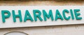 Pharmacie french sign of pharmacy on wall building Royalty Free Stock Photo