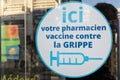 Pharmacien vaccine contre la grippe logo sign and french text of vaccine against