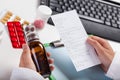 Pharmacist checking prescription Royalty Free Stock Photo