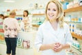 Pharmacist chemist woman working in pharmacy drugstore Royalty Free Stock Photo