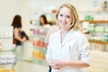 Pharmacist chemist woman working in pharmacy drugstore Royalty Free Stock Photo