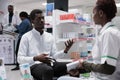 Pharmacist consultation, drugstore seller and customer talking