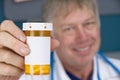 Pharmacist doctor and pill bottle Royalty Free Stock Photo