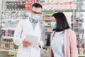 Pharmacist in eyeglasses and medical mask