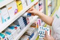 Pharmacist holding medicine box and capsule pack Royalty Free Stock Photo