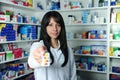 Pharmacist holding pills