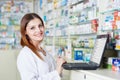 Pharmacist lady using laptop Royalty Free Stock Photo
