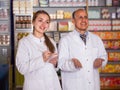 Pharmacist and pharmacy technician in drugstore Royalty Free Stock Photo