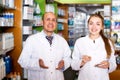 Pharmacist and pharmacy technician in farmacy Royalty Free Stock Photo