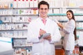 Pharmacist and pharmacy technician working Royalty Free Stock Photo