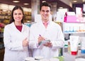 Pharmacist and pharmacy technician working Royalty Free Stock Photo