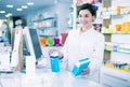 Pharmacist ready to assist in choosing at counter