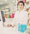 Pharmacist ready to assist in choosing at counter