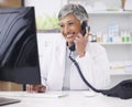 Pharmacist, telephone and computer for prescription with woman in conversation for retail healthcare. Chemist, working