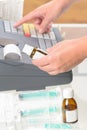 Pharmacist using cash register Royalty Free Stock Photo