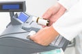 Pharmacist using cash register Royalty Free Stock Photo