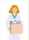 Pharmacist woman holds paper bag with medicines Royalty Free Stock Photo