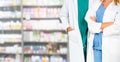 Pharmacist working with colleague in pharmacy Royalty Free Stock Photo