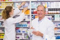 Pharmacists searching medicines with prescription