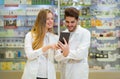 Pharmacists using digital tablet Royalty Free Stock Photo