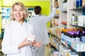 Pharmacists working in modern farmacy Royalty Free Stock Photo