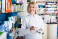 Pharmacists working in modern farmacy Royalty Free Stock Photo