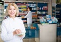 Pharmacists working in modern farmacy Royalty Free Stock Photo