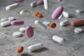Pharmacy background on a dark table. Levitation pills. Tablets on a dark background which falling down. Pills. Medicine and Royalty Free Stock Photo