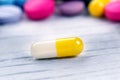 Pharmacy background on a white table. Tablets on a white background. Pills. Medicine and healthy. Close up of capsules. Differend