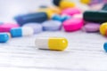 Pharmacy background on a white table. Tablets on a white background. Pills. Medicine and healthy. Close up of capsules. Differend