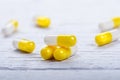 Pharmacy background on a white table. Tablets on a white background. Pills. Medicine and healthy. Close up of capsules. Differend