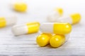 Pharmacy background on a white table. Tablets on a white background. Pills. Medicine and healthy. Close up of capsules. Differend