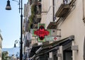 A Pharmacy and baroque street lamps in Sorrento, Italy