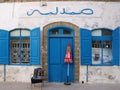 Pharmacy with blue windows and doors in Essaouira, Morocco