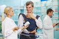 Pharmacy chemist, father and child in drugstore Royalty Free Stock Photo