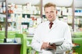 Pharmacy chemist man in drugstore Royalty Free Stock Photo