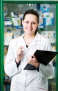 Pharmacy chemist woman in drugstore