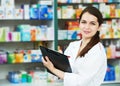 Pharmacy chemist woman in drugstore