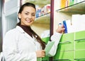 Pharmacy chemist woman in drugstore