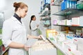Pharmacy chemist women in drugstore Royalty Free Stock Photo