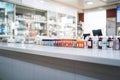 Pharmacy counter, well stocked with medicines, serving healthcare needs efficiently